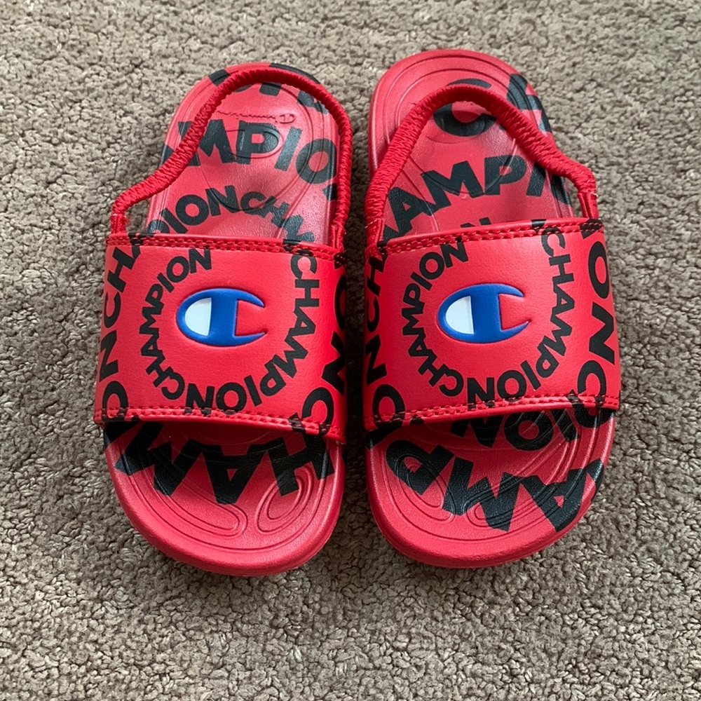 Champion slides toddler